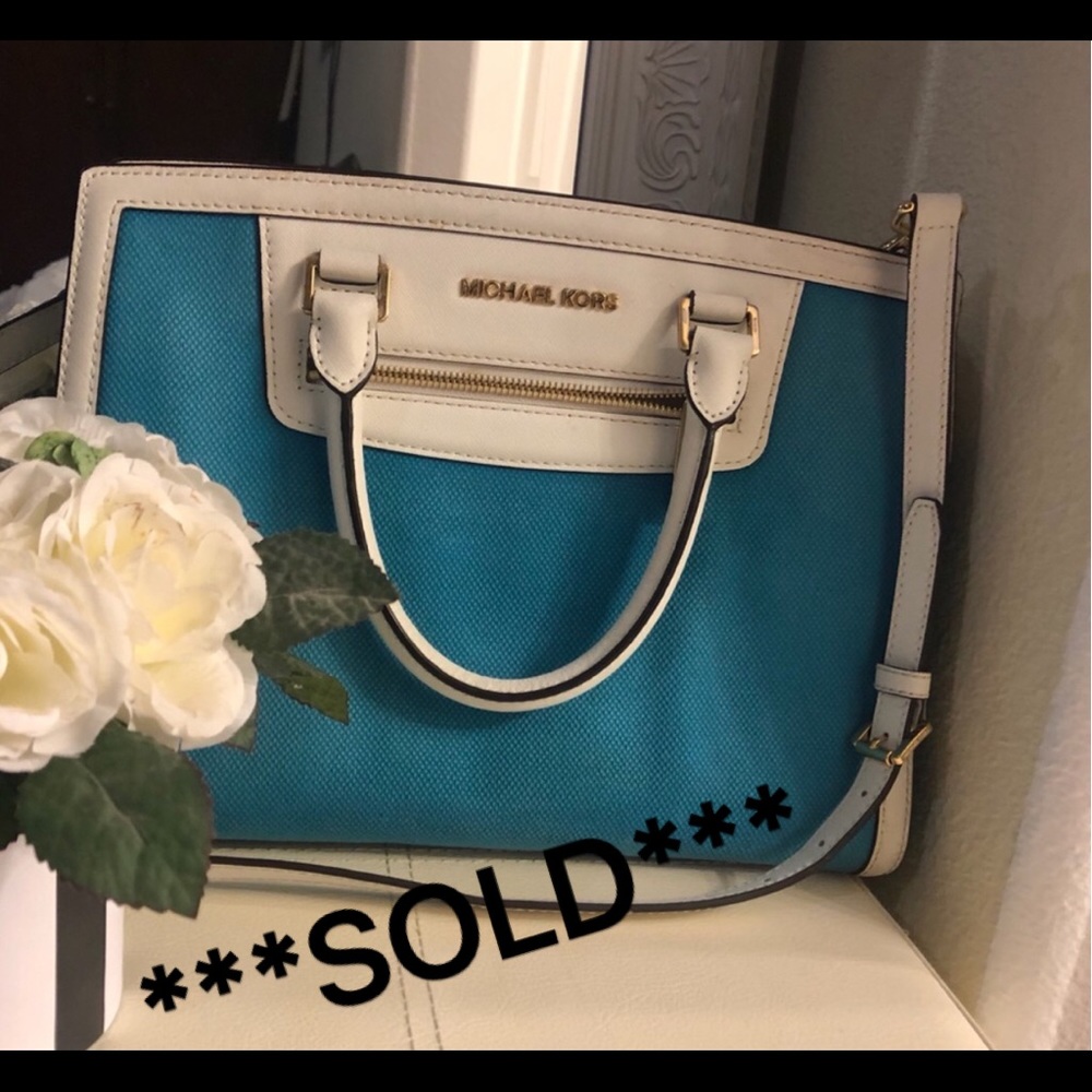 Like new turquoise Michael Kors satchel.